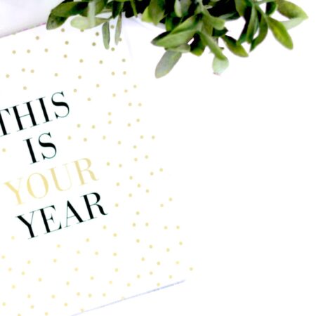 A notebook reading This Is Your Year
